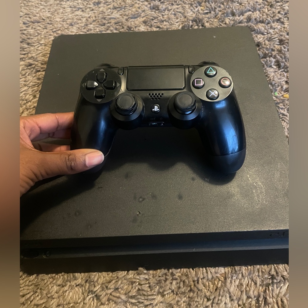 PlayStation 4 with controller